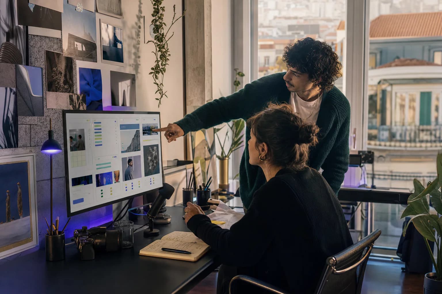 Creators planning digital campaign content together in a studio